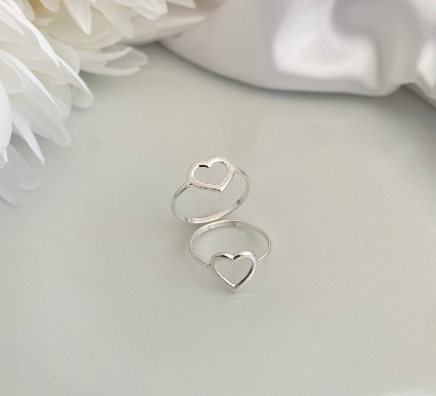 ANEL PRATA CORAÇÃO VAZADO