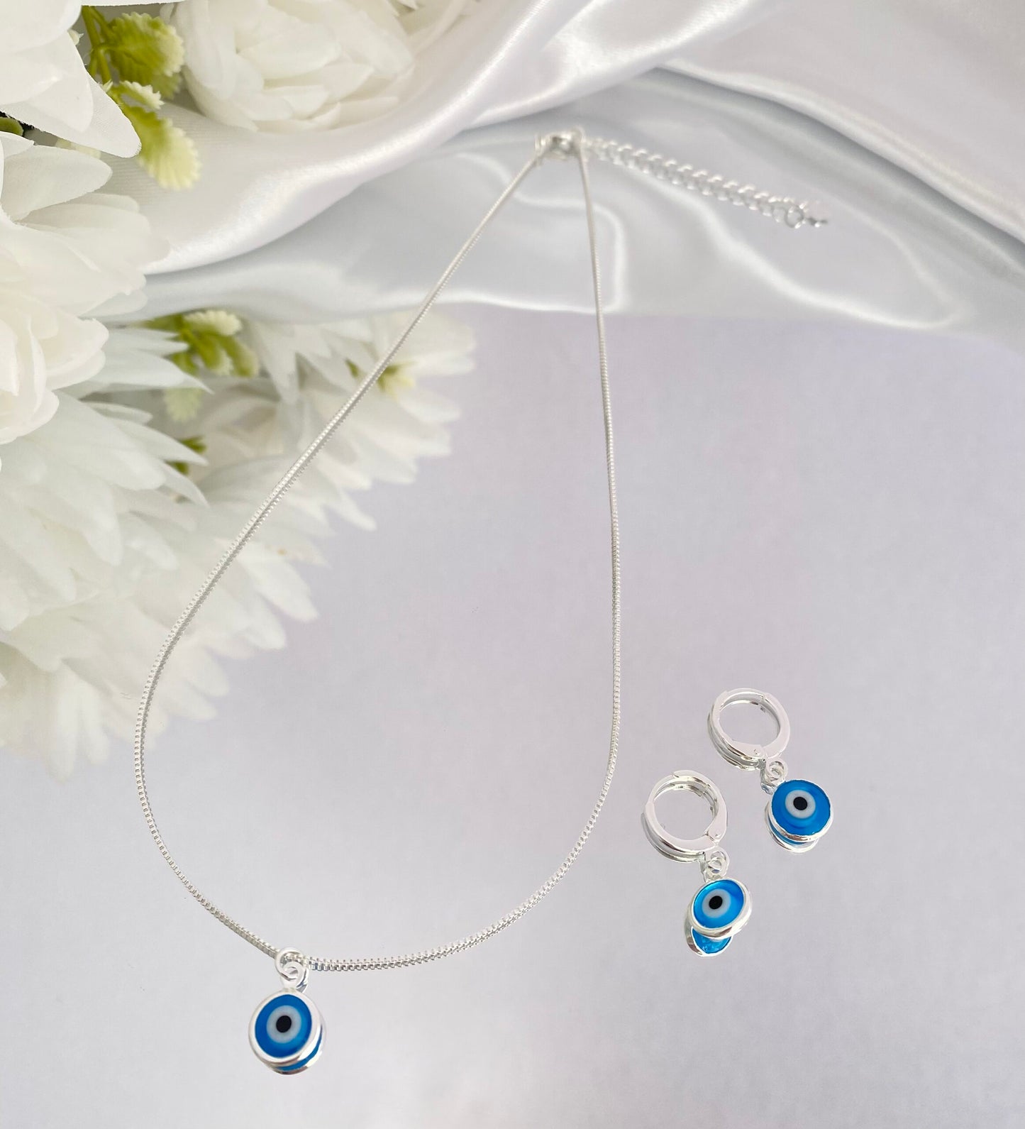 CONJUNTO PRATA COM OLHO GREGO