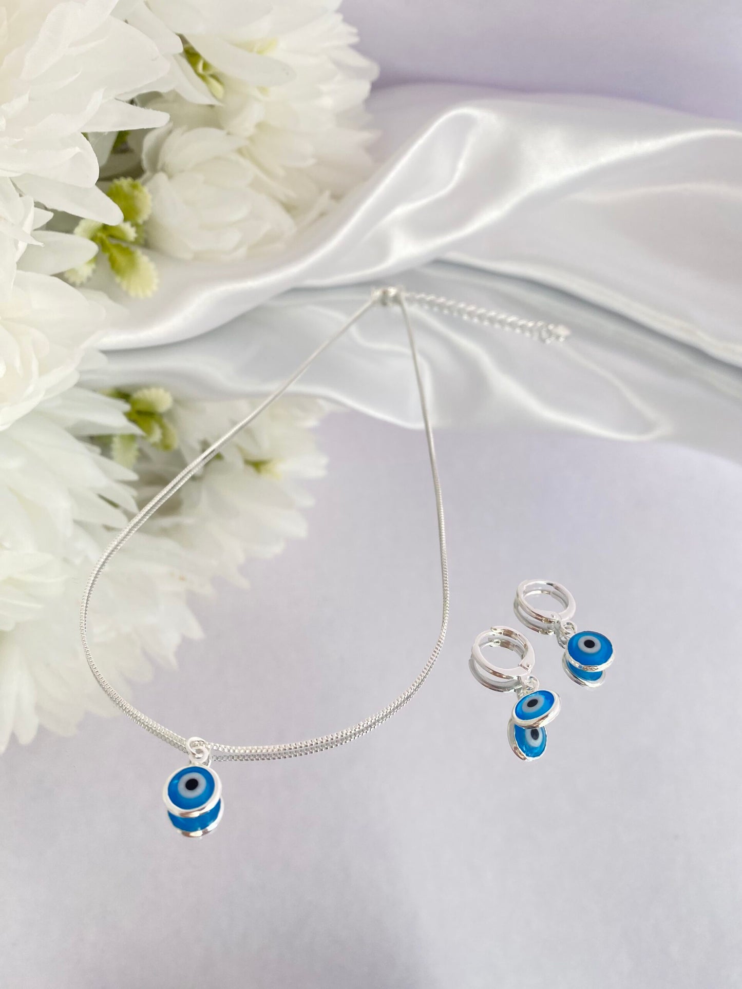 CONJUNTO PRATA COM OLHO GREGO