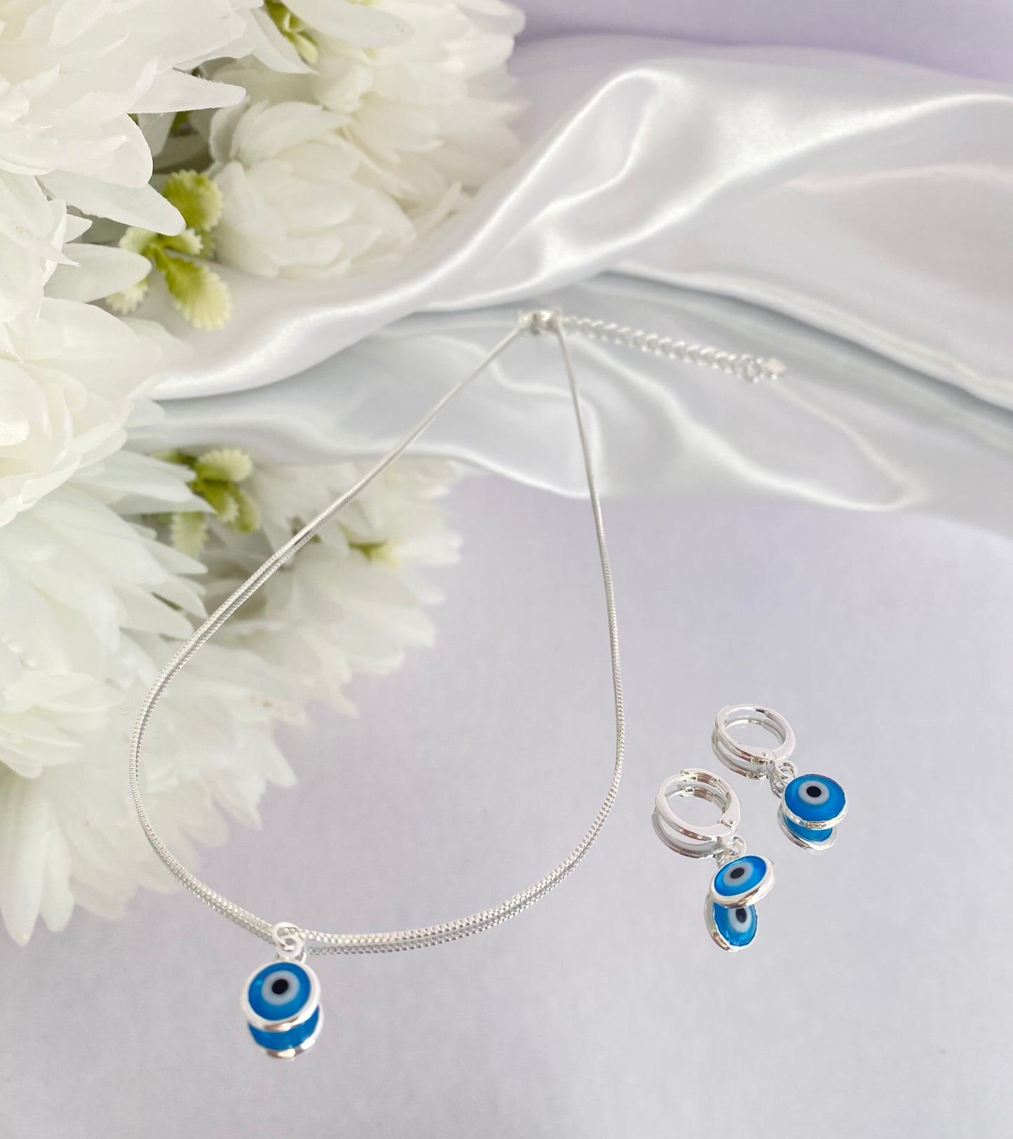 CONJUNTO PRATA COM OLHO GREGO