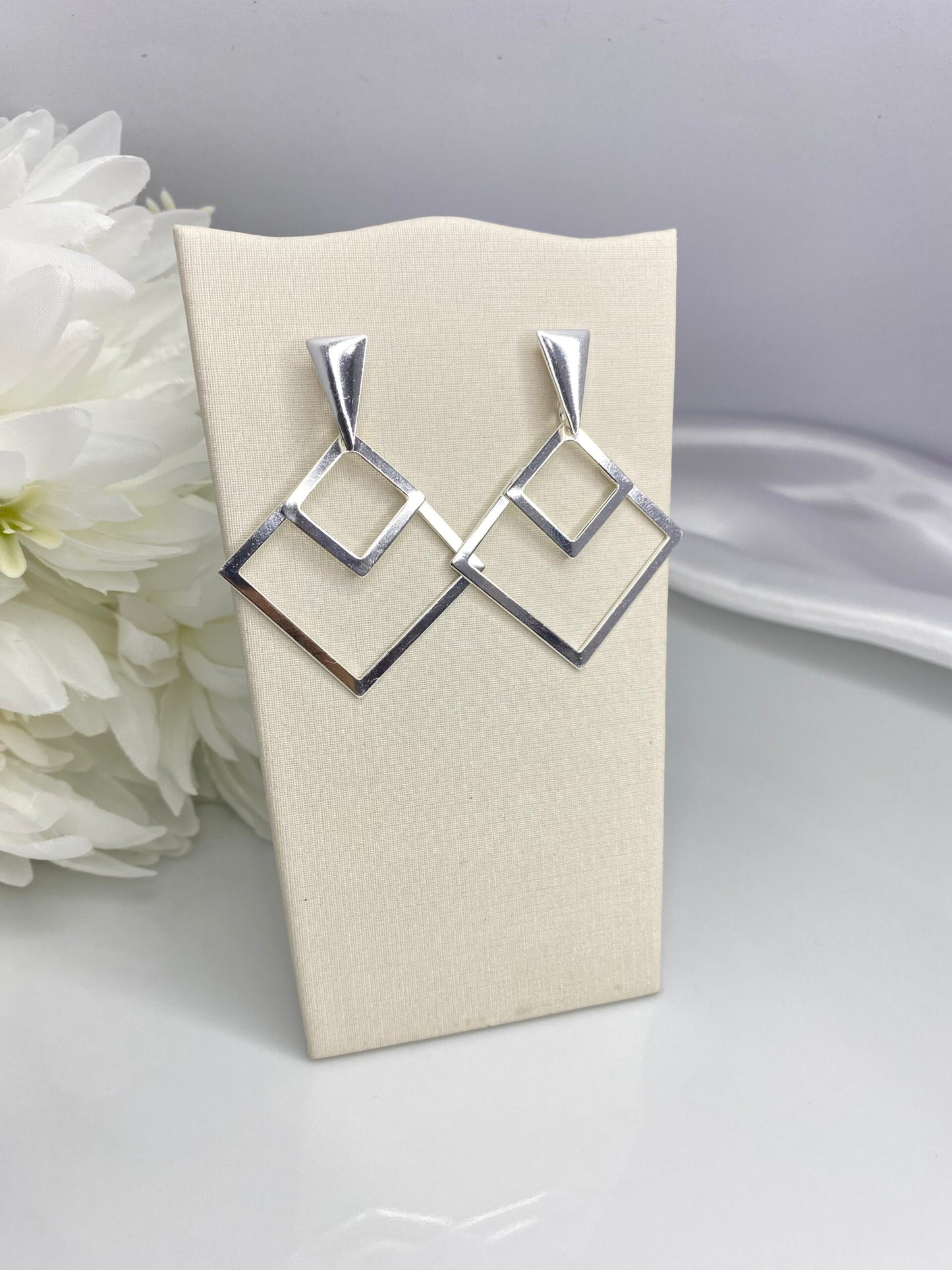 BRINCO PRATA VÉRTICE