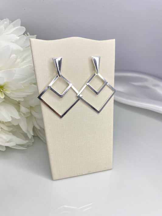 BRINCO PRATA VÉRTICE