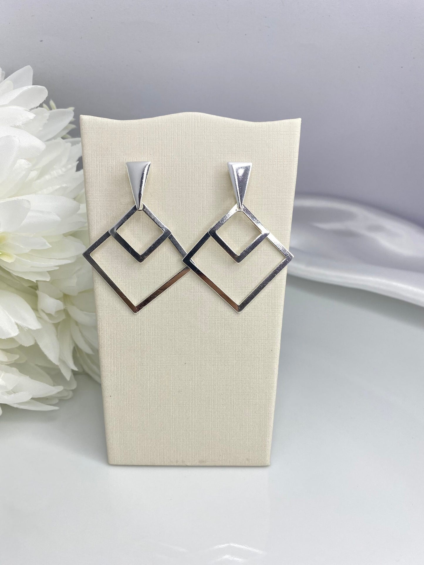 BRINCO PRATA VÉRTICE