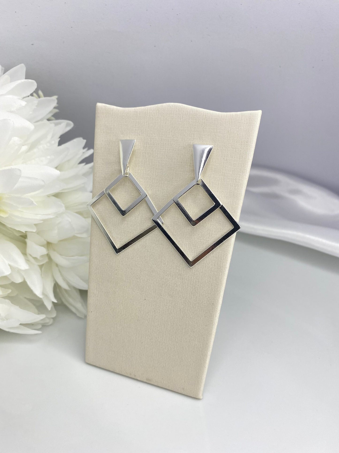 BRINCO PRATA VÉRTICE