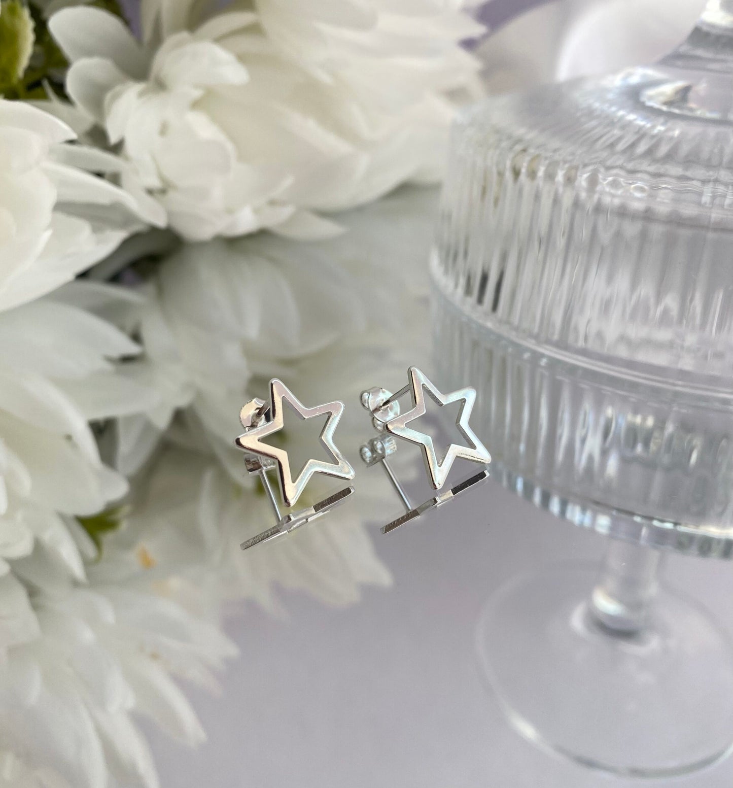 BRINCO PRATA ESTRELA VAZADO MÉDIO