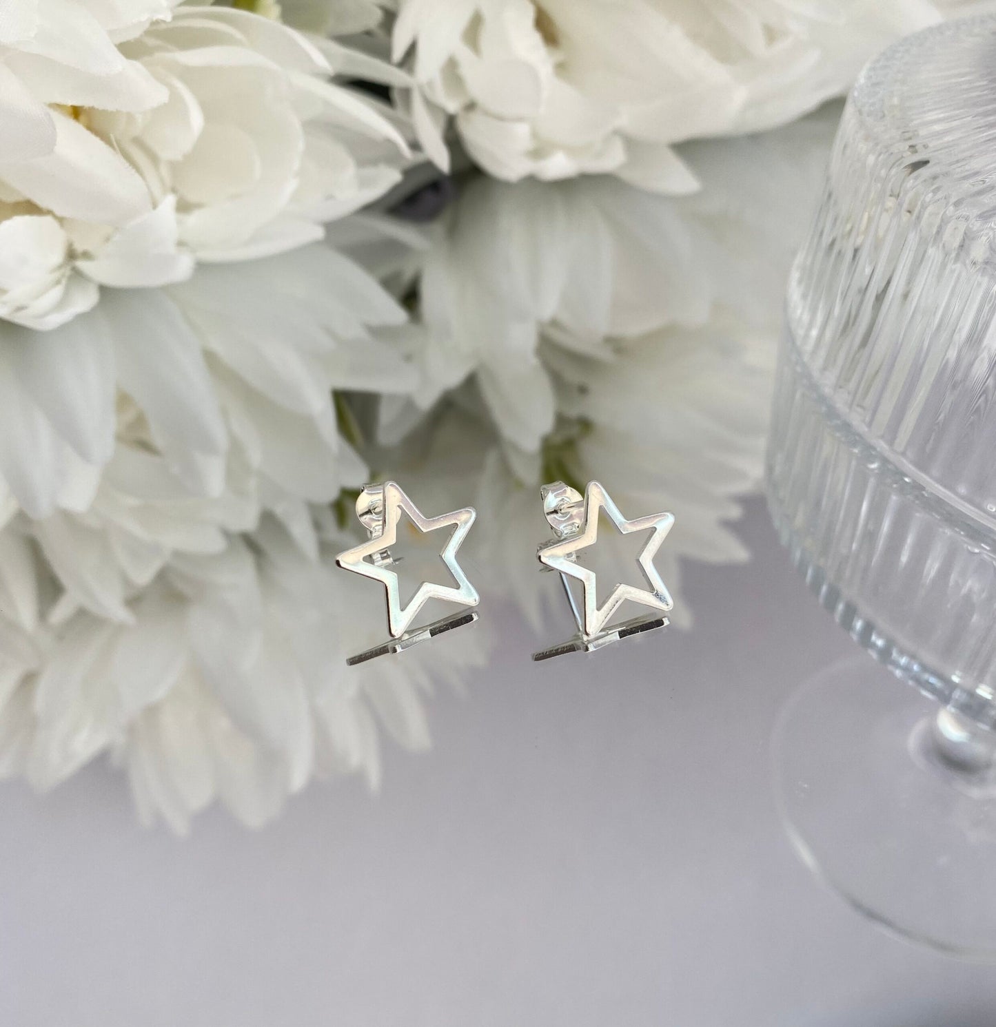 BRINCO PRATA ESTRELA VAZADO MÉDIO