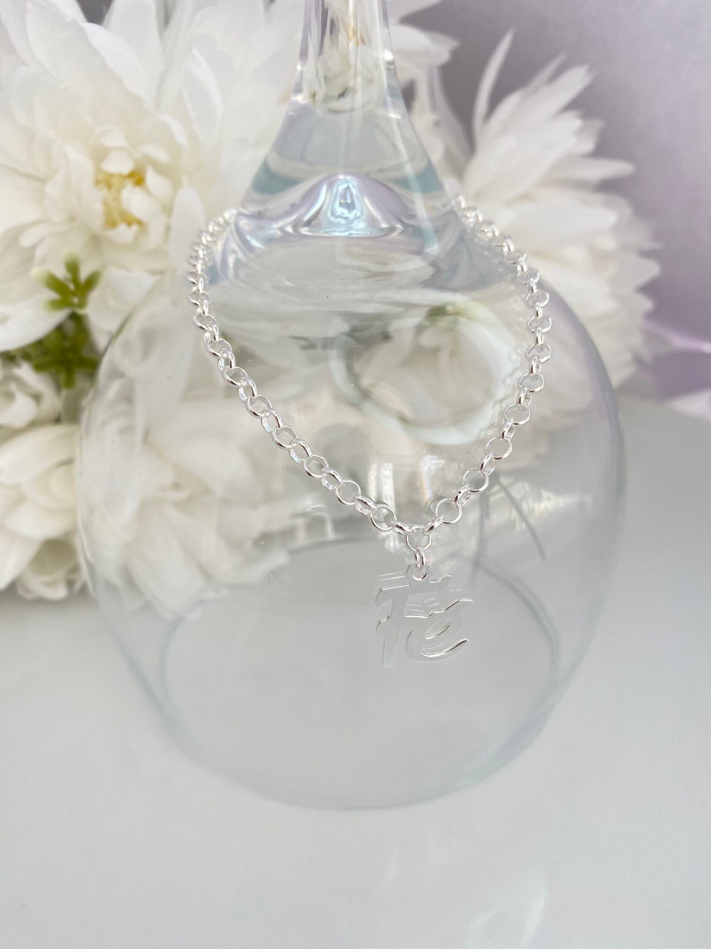 PULSEIRA PRATA COM PINGENTE FÉ