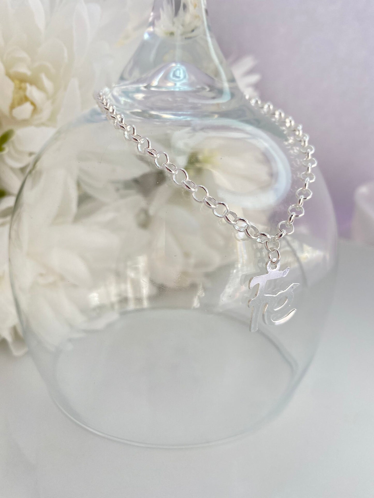 PULSEIRA PRATA COM PINGENTE FÉ