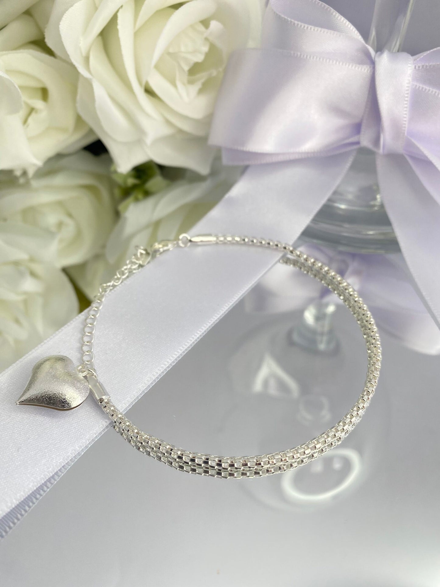 PULSEIRA PRATA CORAÇÃO DE SEDA