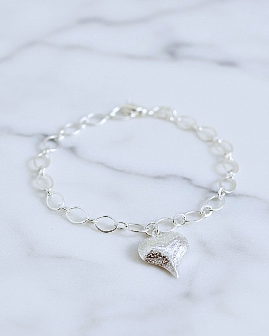 PULSEIRA PRATA EM ELOS CORAÇÃO BRUTO