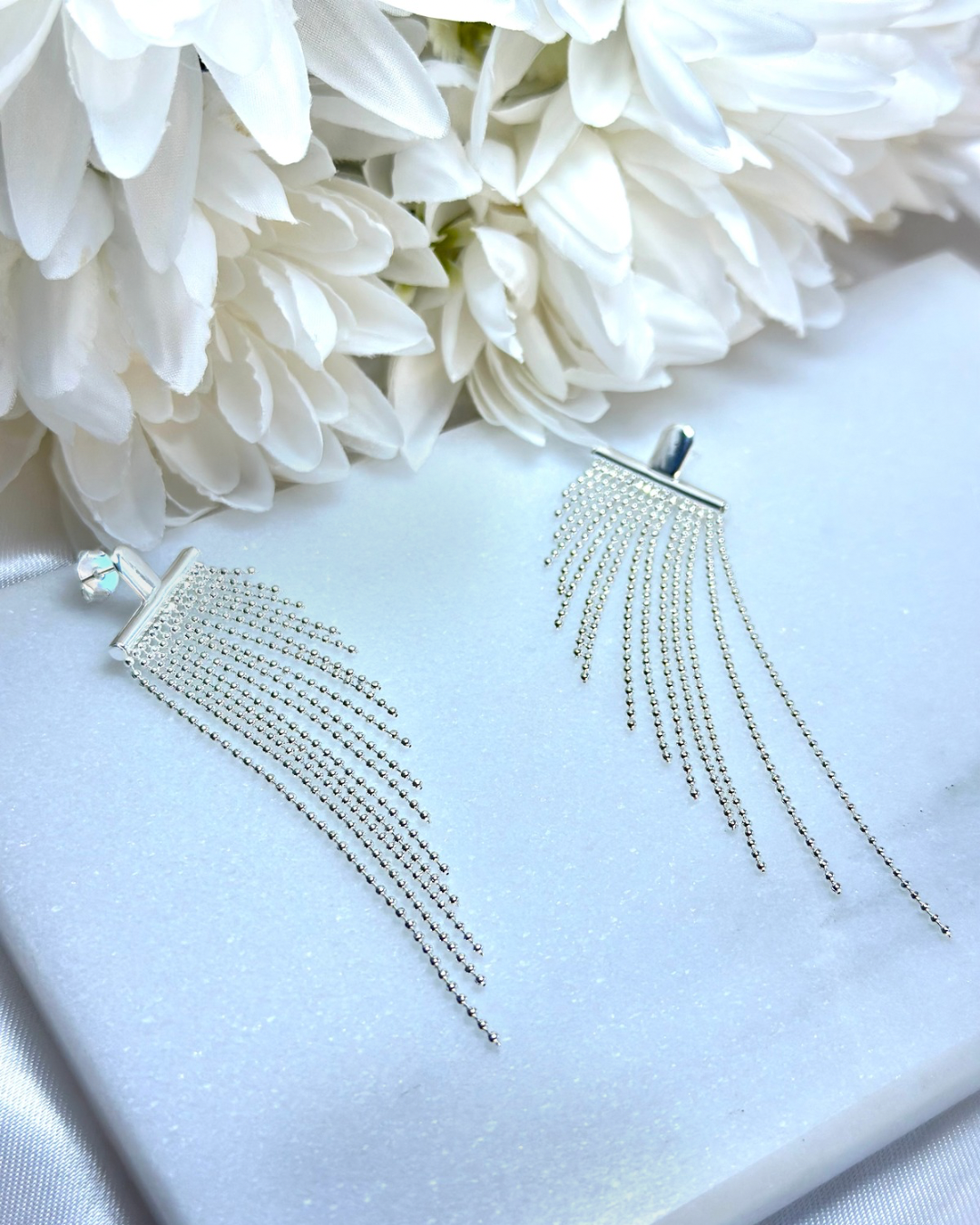 BRINCO CASCATA BANHADO A PRATA